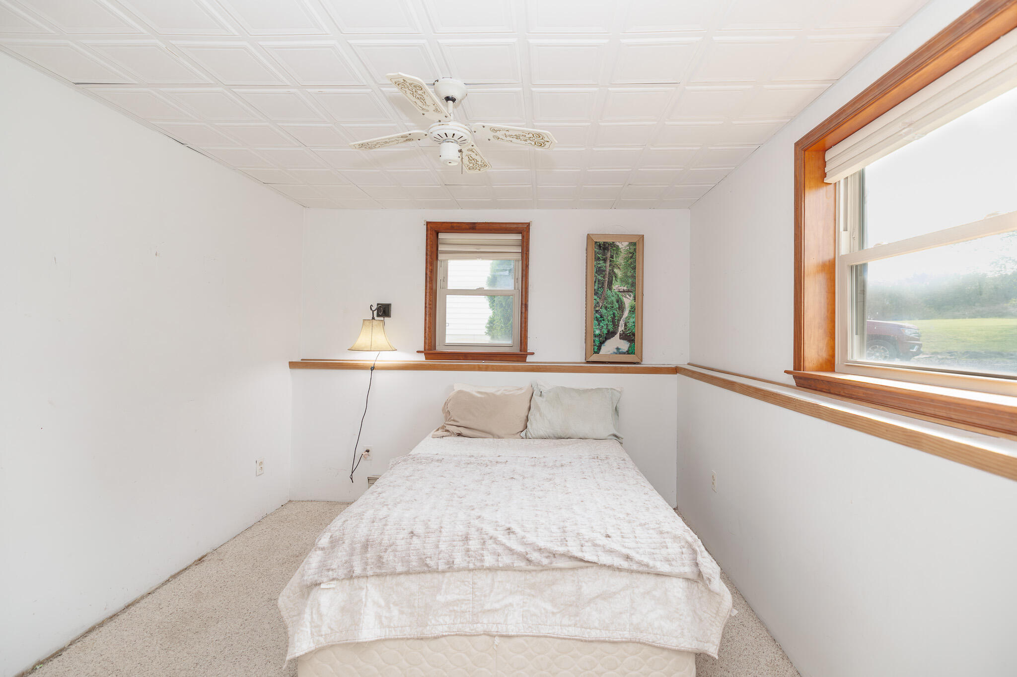 924 Hell Hollow Road Kunkletown, PA 18058 - Photo 43 of 60 a bedroom with a large bed and a chandelier