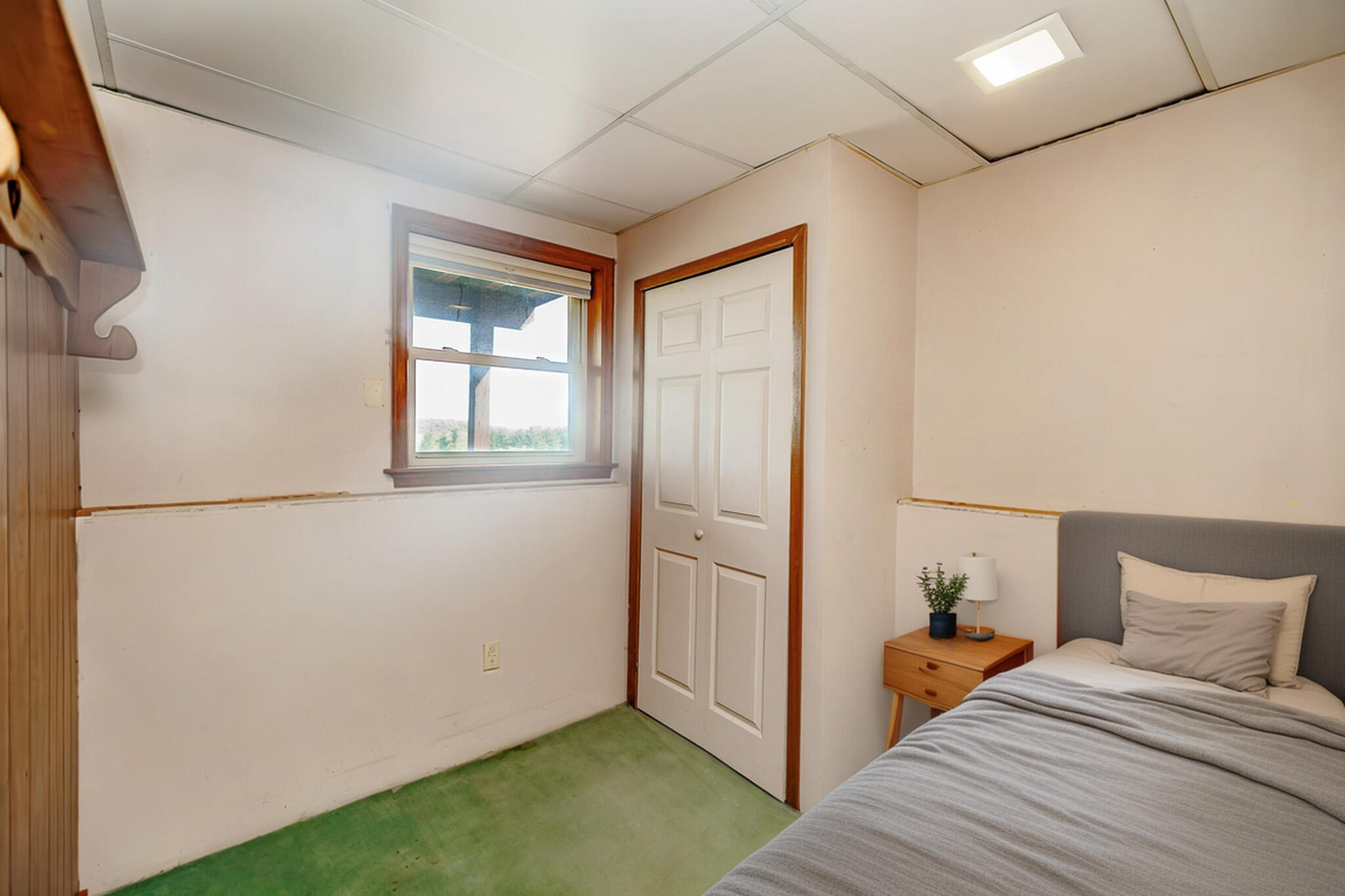 924 Hell Hollow Road Kunkletown, PA 18058 - Photo 48 of 60 a view of a room that has a bed and a window in it