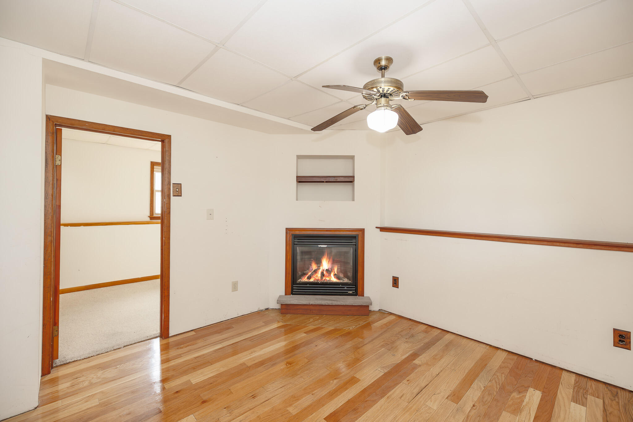 924 Hell Hollow Road Kunkletown, PA 18058 - Photo 49 of 60 a view of an empty room with wooden floor and a window