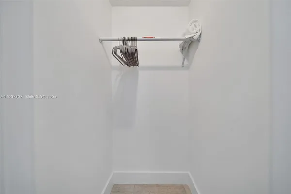 a view of small space with racks on the wall