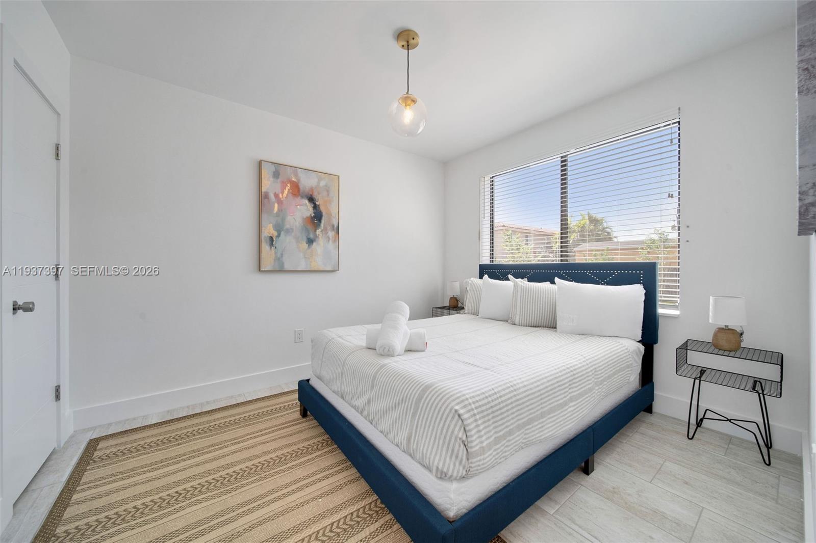 2162 Southwest 14th Terrace, Unit 101 Miami, FL 33145 - Photo 8 of 13 Queen bed