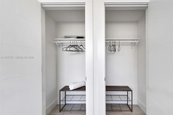 a view of small space with racks on the wall