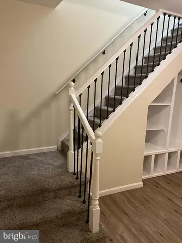 a view of entryway with wooden floor