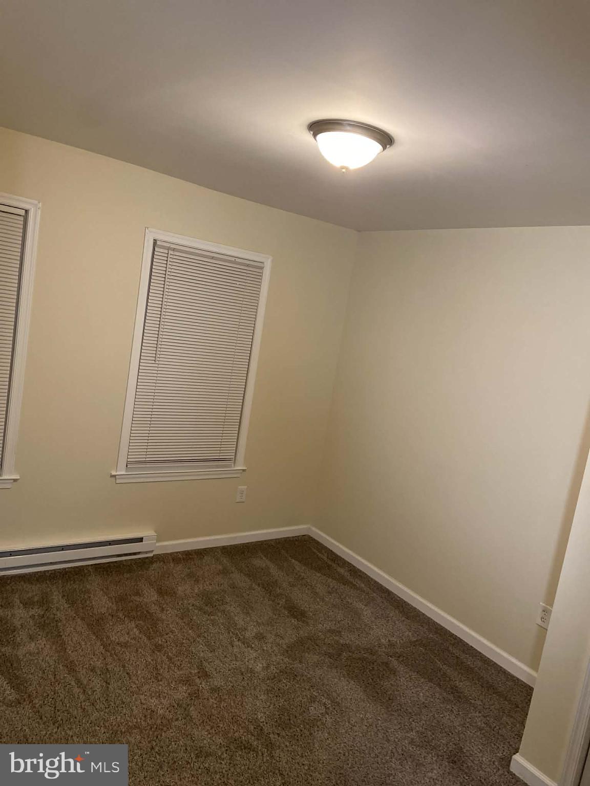 1416 East 5th Street Bethlehem, PA 18015 - Photo 16 of 26 an empty room with a window