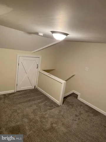an empty room with cabinet