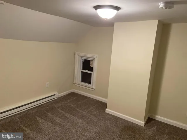 an empty room with a workbench