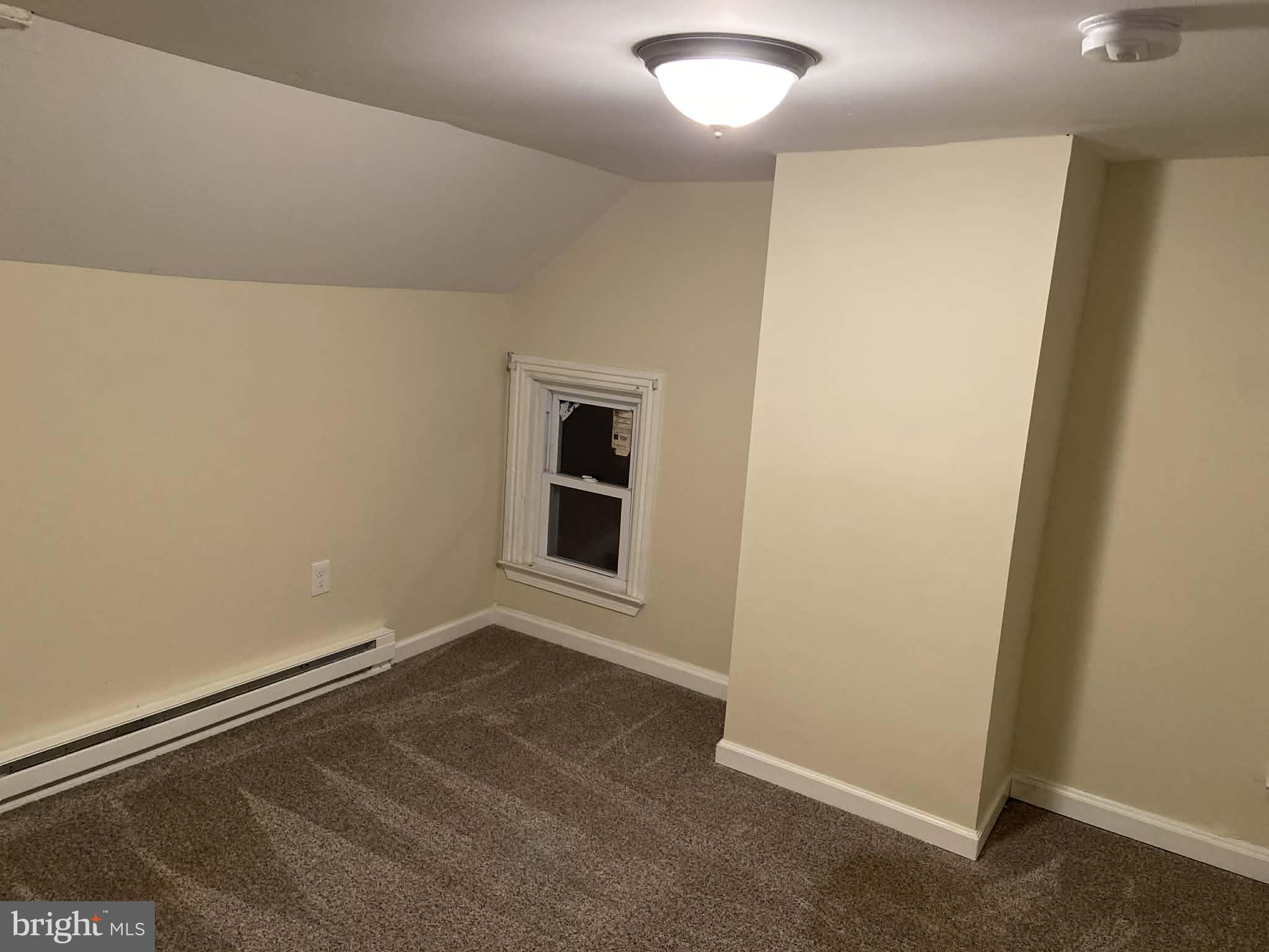 1416 East 5th Street Bethlehem, PA 18015 - Photo 21 of 26 an empty room with a workbench