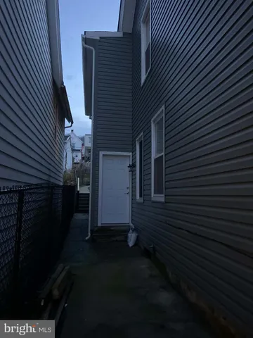 a view of backyard of a house