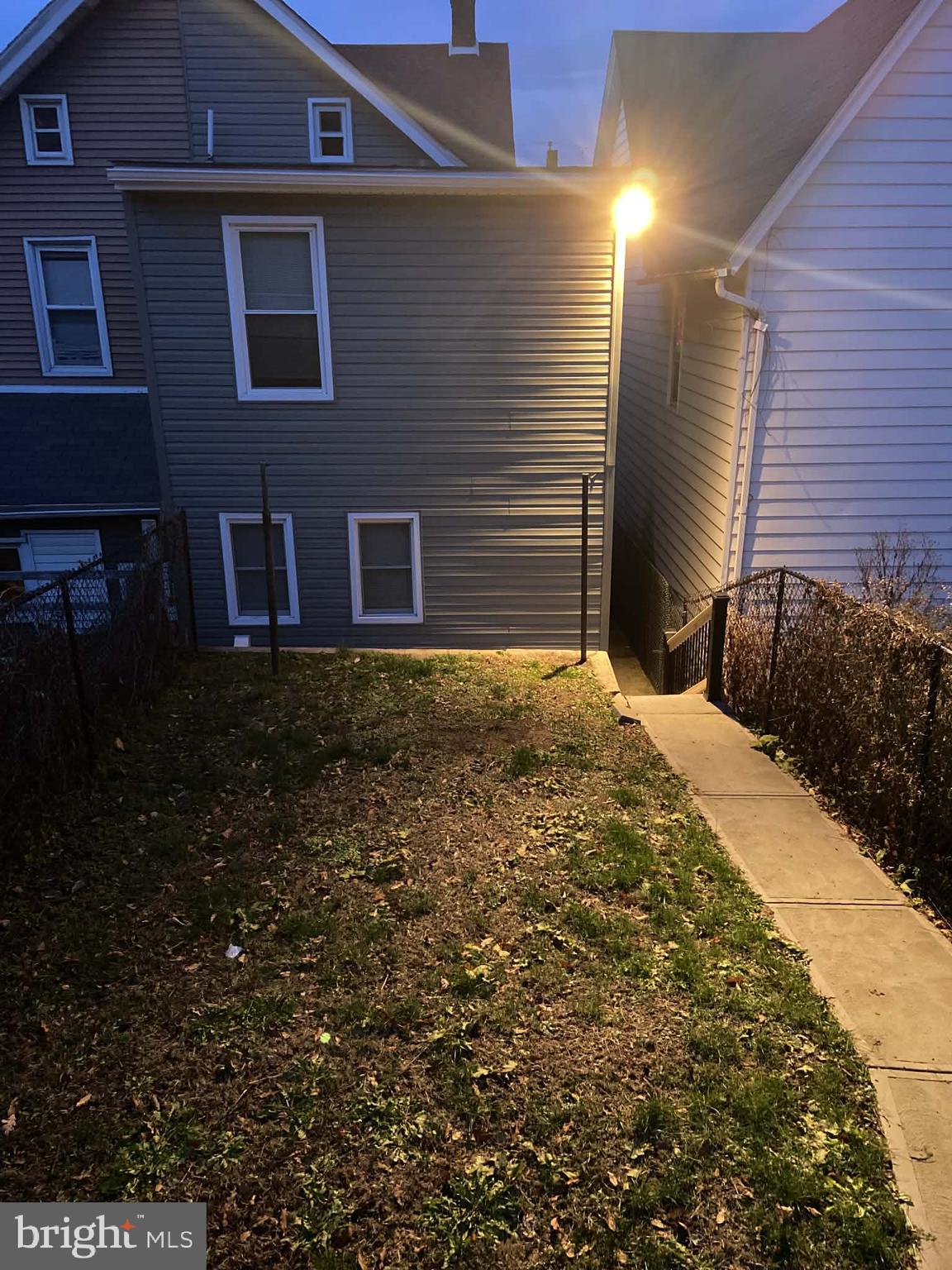 1416 East 5th Street Bethlehem, PA 18015 - Photo 26 of 26 a brick house with a yard