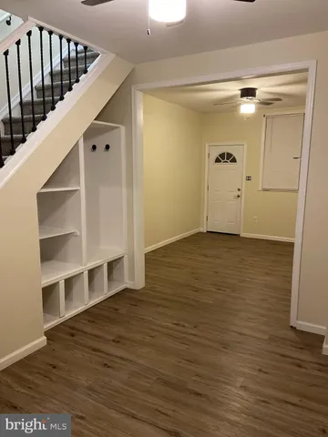 a view of entryway with wooden floor