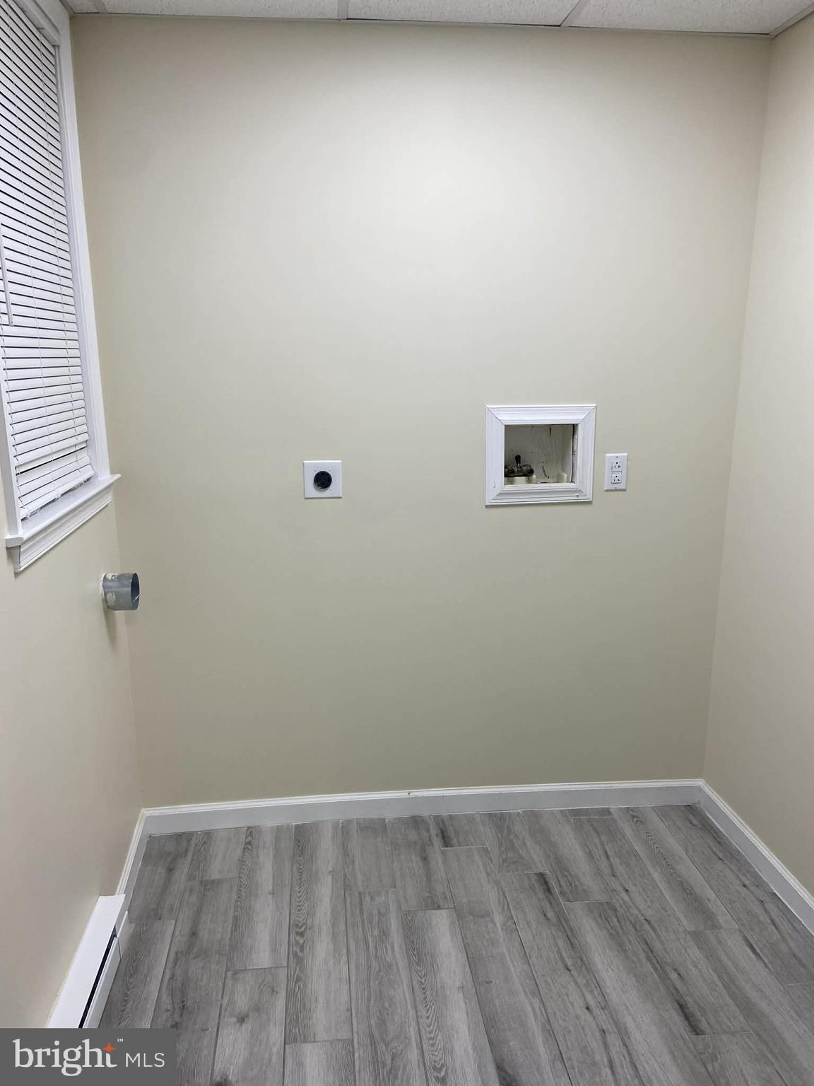 1416 East 5th Street Bethlehem, PA 18015 - Photo 10 of 26 a view of an empty room with wooden floor and a window