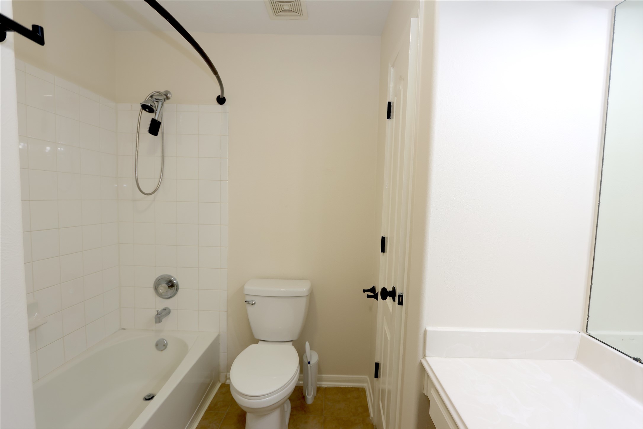 1902 Lantana Spring Lane Pearland, TX 77581 - Photo 15 of 18 a bathroom with a toilet and a shower