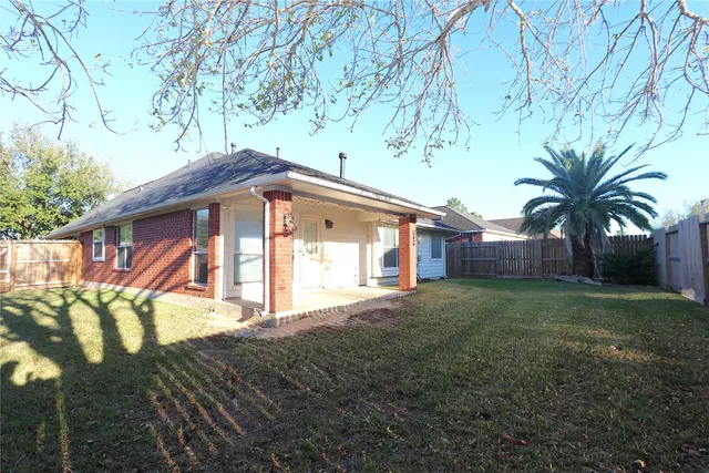 a house view with a garden space