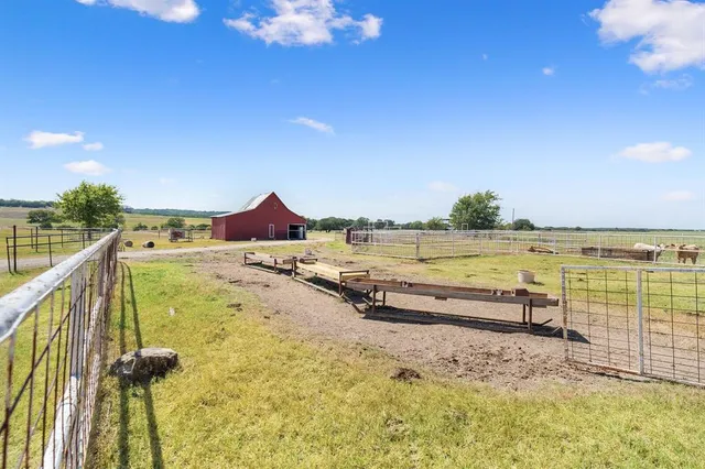 a view of swimming pool with seating area