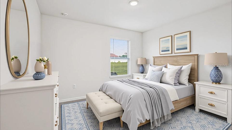 6911 Southwest 44th Circle Ocala, FL 34476 - Photo 6 of 19 a bedroom with bed and window