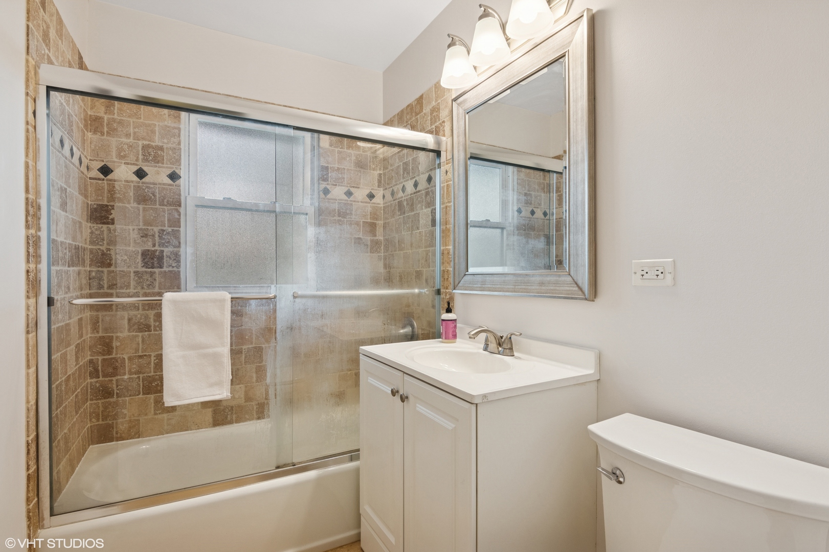 167 Glendale Street Wheeling, IL 60090 - Photo 16 of 22 a bathroom with a sink toilet and shower