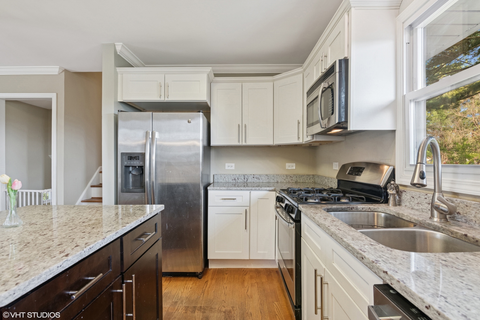 167 Glendale Street Wheeling, IL 60090 - Photo 5 of 22 a kitchen with stainless steel appliances granite countertop a sink stove and refrigerator