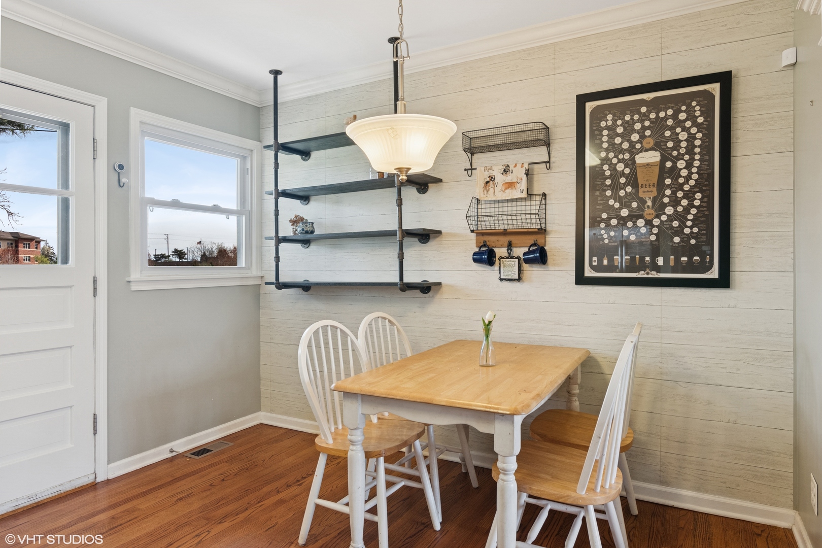 167 Glendale Street Wheeling, IL 60090 - Photo 7 of 22 a view of a dining room with furniture and wooden floor