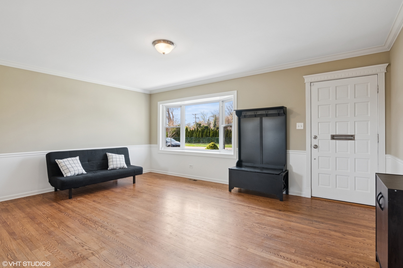 167 Glendale Street Wheeling, IL 60090 - Photo 9 of 22 a living room with furniture and a window