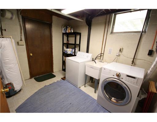 24 Barnhart Street Rural Ridge, PA 15075 - Photo 13 of 18 Other. This spacious laundry room features a sink (tub) and egress window for natural light. There also is additional storage space.
