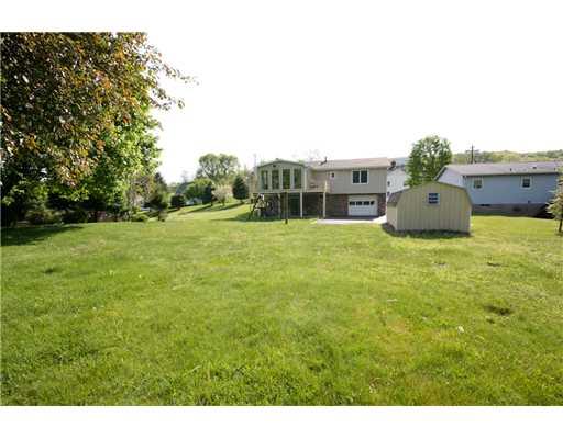 24 Barnhart Street Rural Ridge, PA 15075 - Photo 15 of 18 Exterior Back. Here is a rear exterior view from the back of the yard. This home has been well-maintained inside and out!