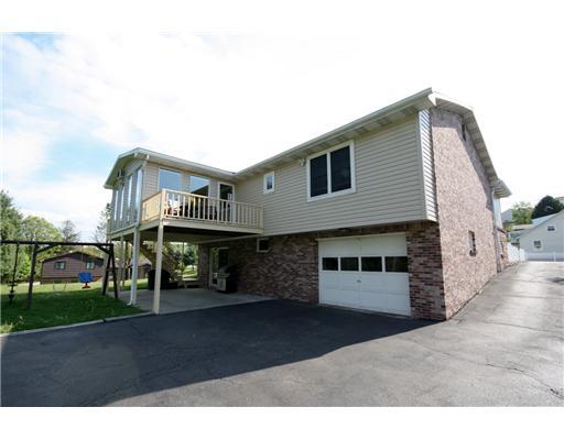 24 Barnhart Street Rural Ridge, PA 15075 - Photo 16 of 18 Land. The patio at the back walkout of the house also is used as a covered parking pad in addition to the garage and large driveway.