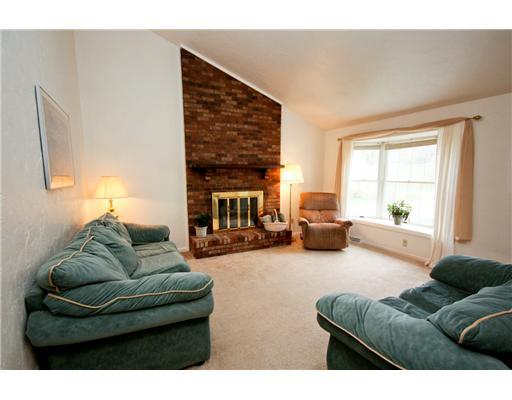 24 Barnhart Street Rural Ridge, PA 15075 - Photo 3 of 18 Den/Family/Great Room. The homes family room features a tall vaulted ceiling, brick fireplace and neutral colors. The large bay window welcomes natural sunlight during the day.