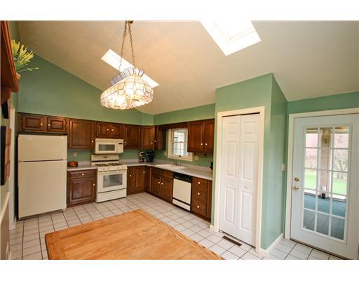 24 Barnhart Street Rural Ridge, PA 15075 - Photo 4 of 18 Kitchen. The kitchen features a tall vaulted ceiling with skylights. This spcious kitchen has a large pantry and eat-in area. Fresh paint and a ceramic tile foor finish off the space.
