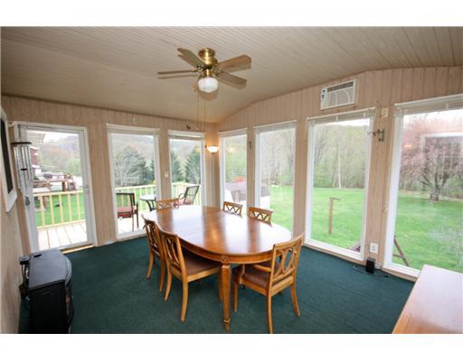 24 Barnhart Street Rural Ridge, PA 15075 - Photo 6 of 18 Dining Room. This sun room/dining room is an all season room that is comfortable for use all year long. It is located off of the kitchen and has wonderful views of the yard with it s three walls of windows. There also is access to the deck and yard.