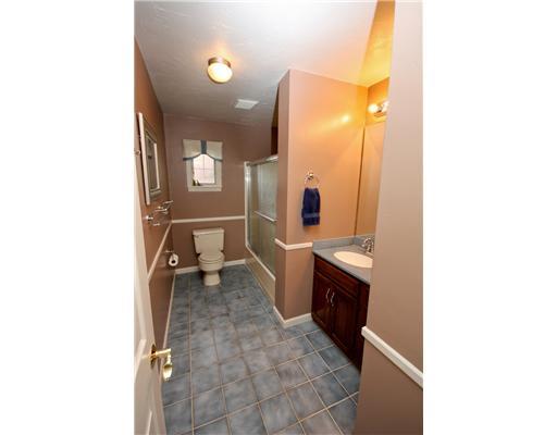 24 Barnhart Street Rural Ridge, PA 15075 - Photo 8 of 18 Master Bath/Spa. This updated bathroom features ceramic tile floors, fresh paint, vanity with under cabinet storage. There is a tub/shower combination and chair rail trimwork.