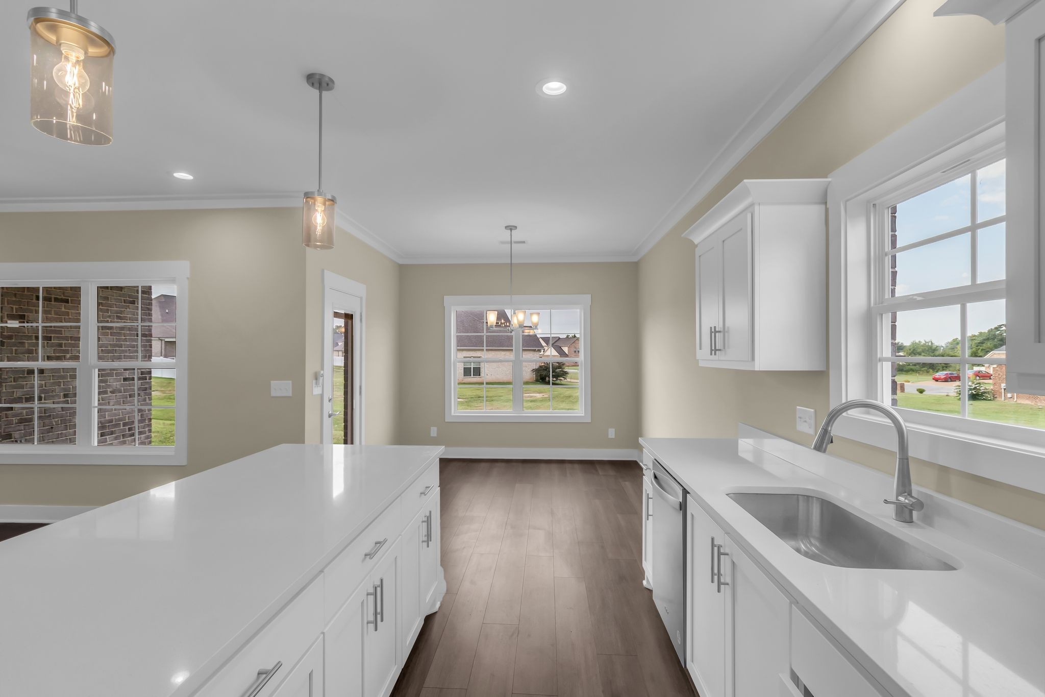 1176 Rimrock Road Smyrna, TN 37167 - Photo 16 of 40 a kitchen with stainless steel appliances granite countertop a sink a stove and a wooden floors