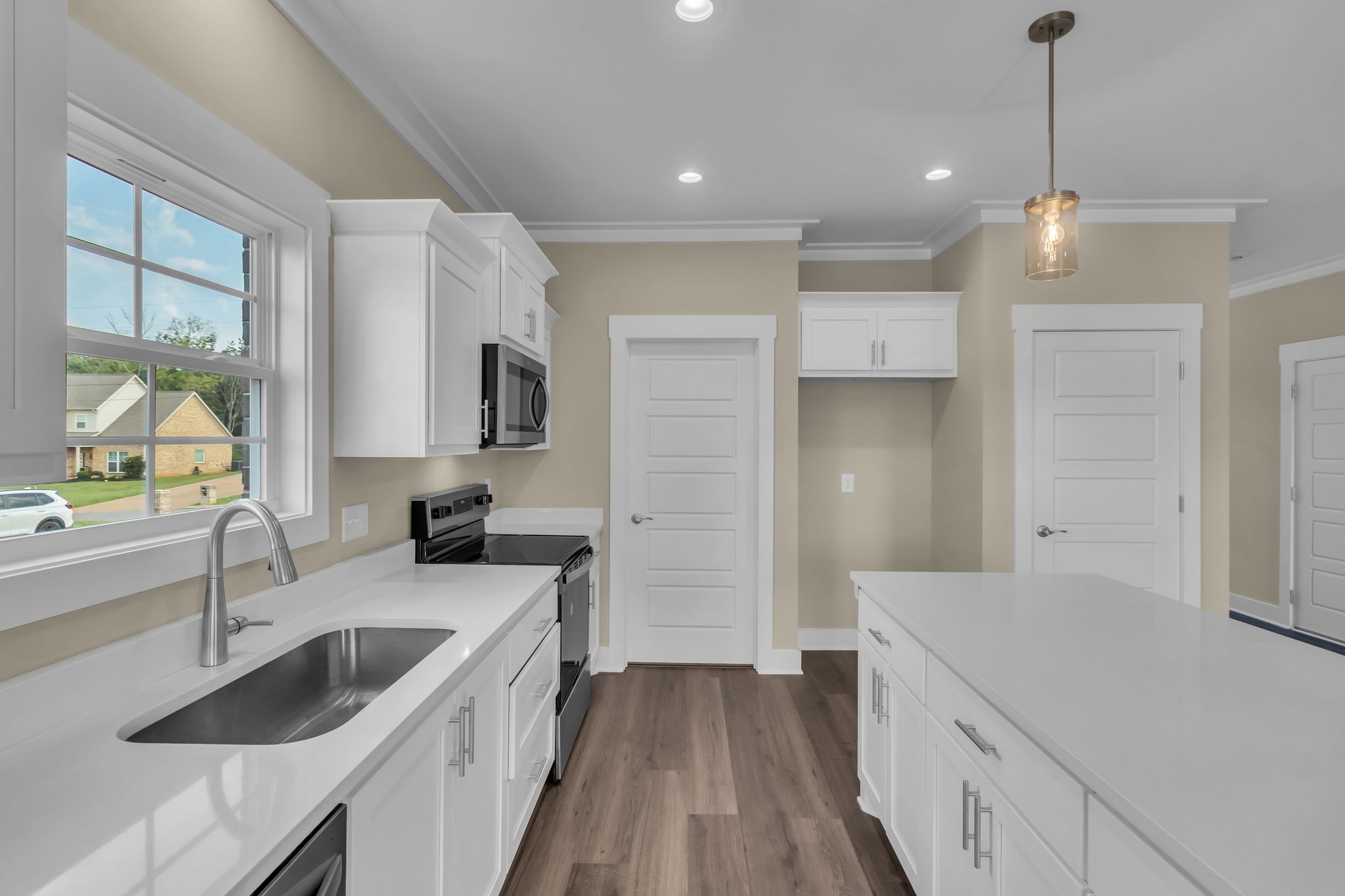 1176 Rimrock Road Smyrna, TN 37167 - Photo 17 of 40 a kitchen with a sink stove and refrigerator