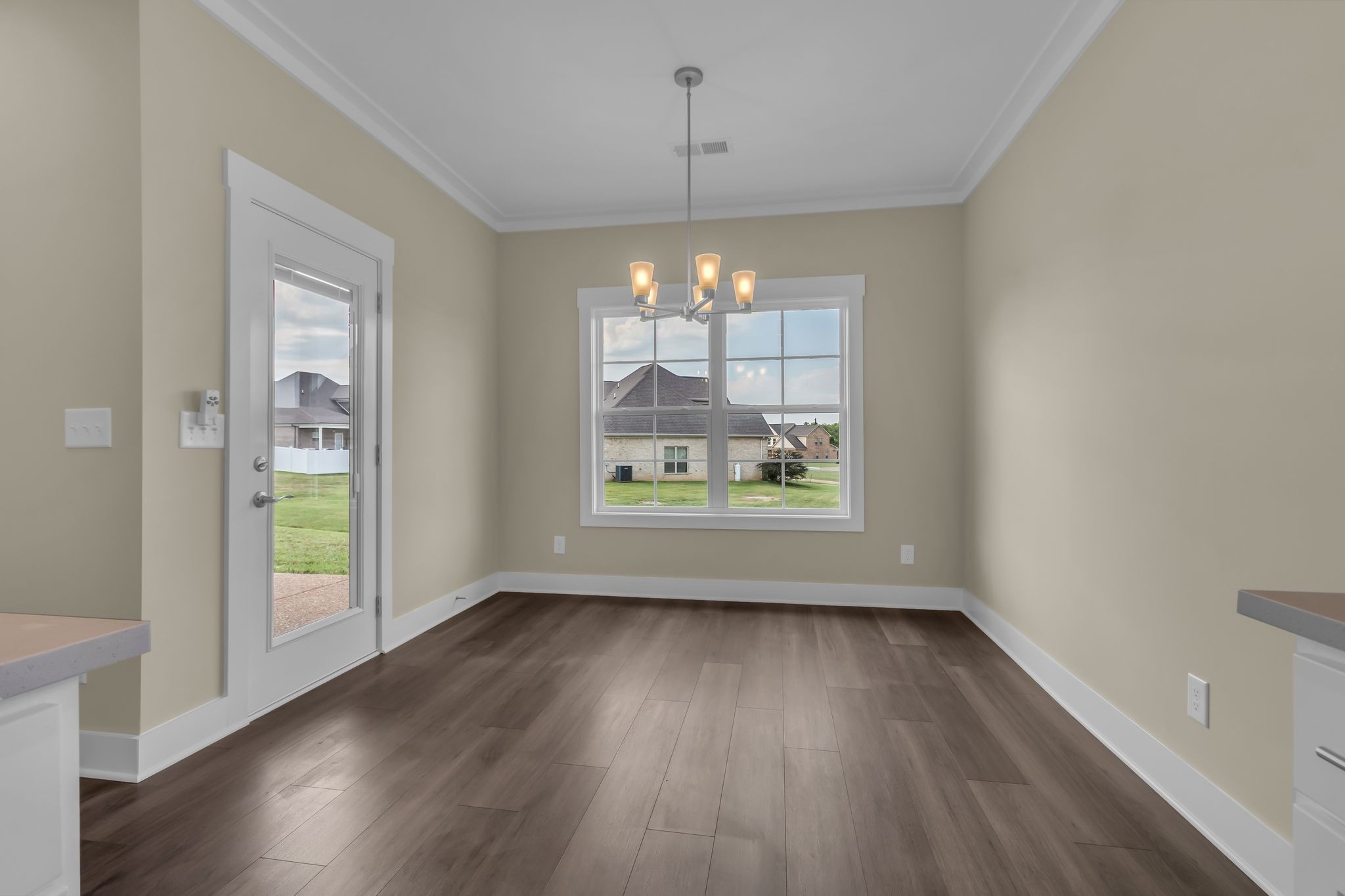 1176 Rimrock Road Smyrna, TN 37167 - Photo 19 of 40 wooden floor in an empty room with a window