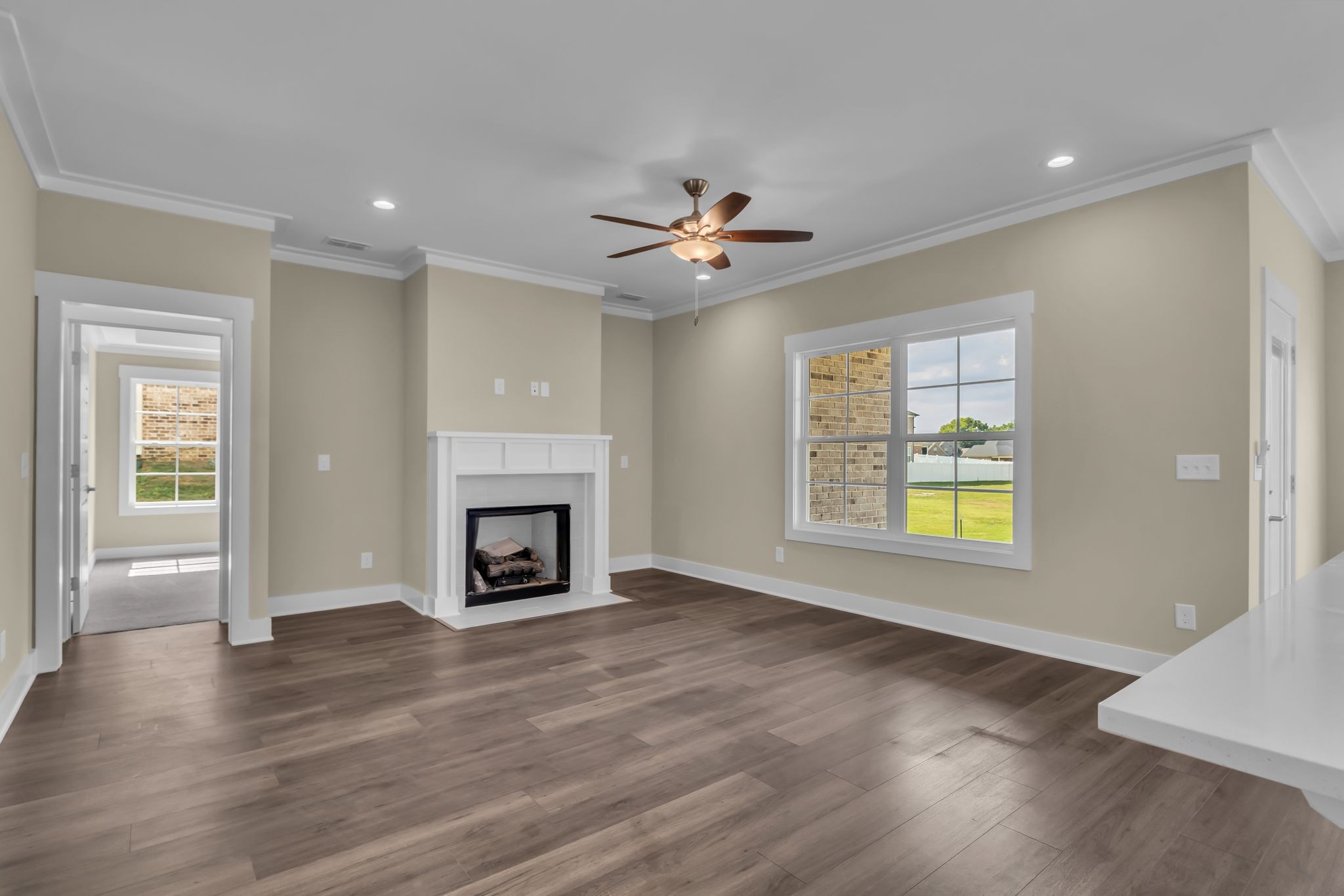1176 Rimrock Road Smyrna, TN 37167 - Photo 20 of 40 an empty room with windows and a fireplace