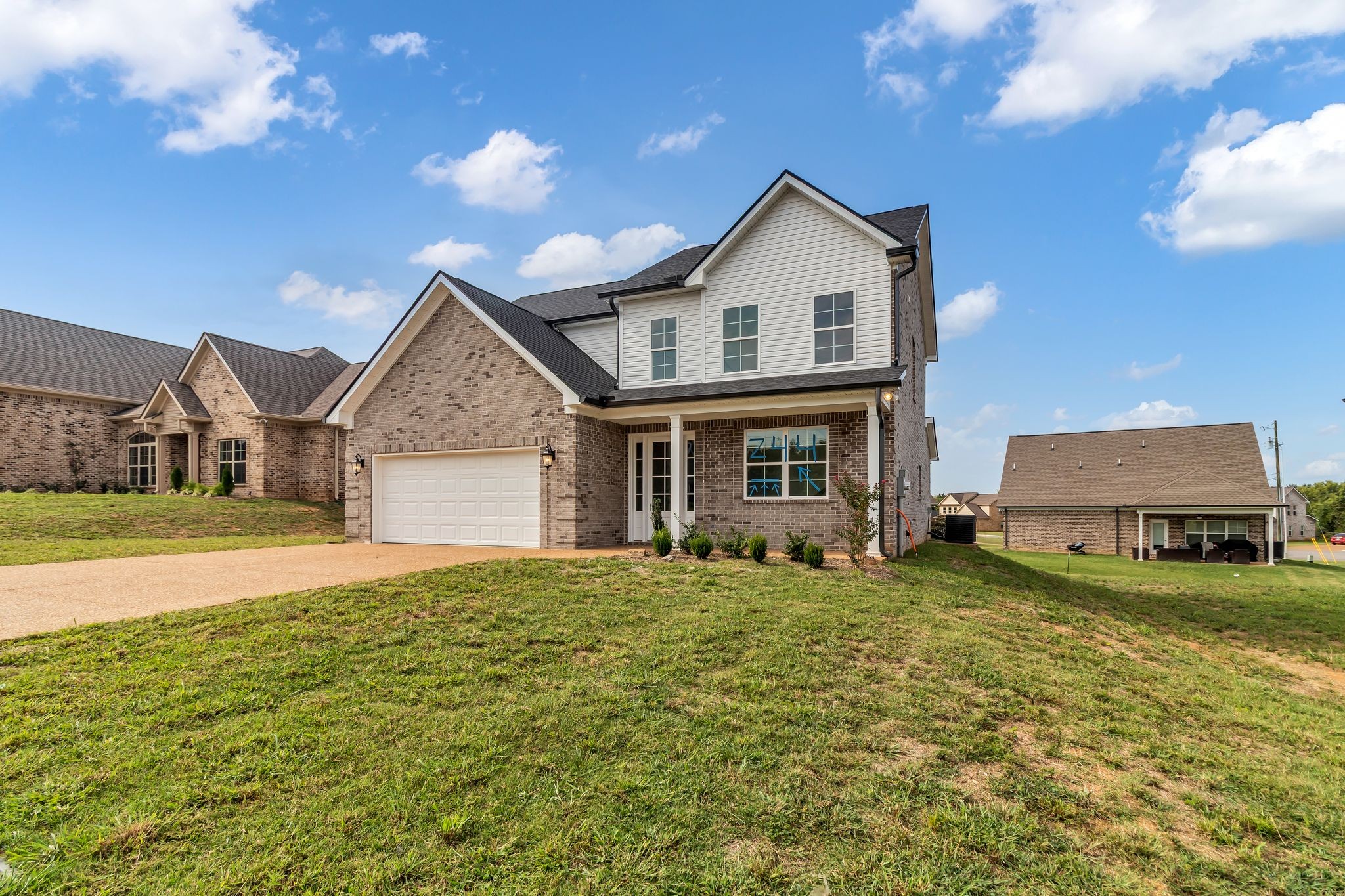 1176 Rimrock Road Smyrna, TN 37167 - Photo 2 of 40 a view of a house with a yard and sitting area