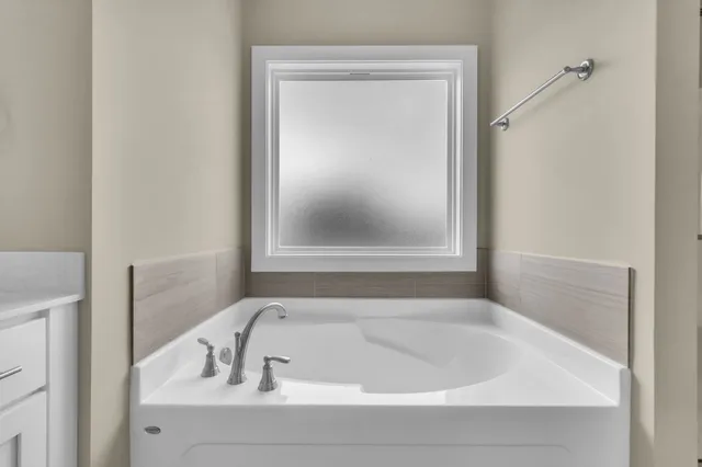 a bathroom with a bathtub