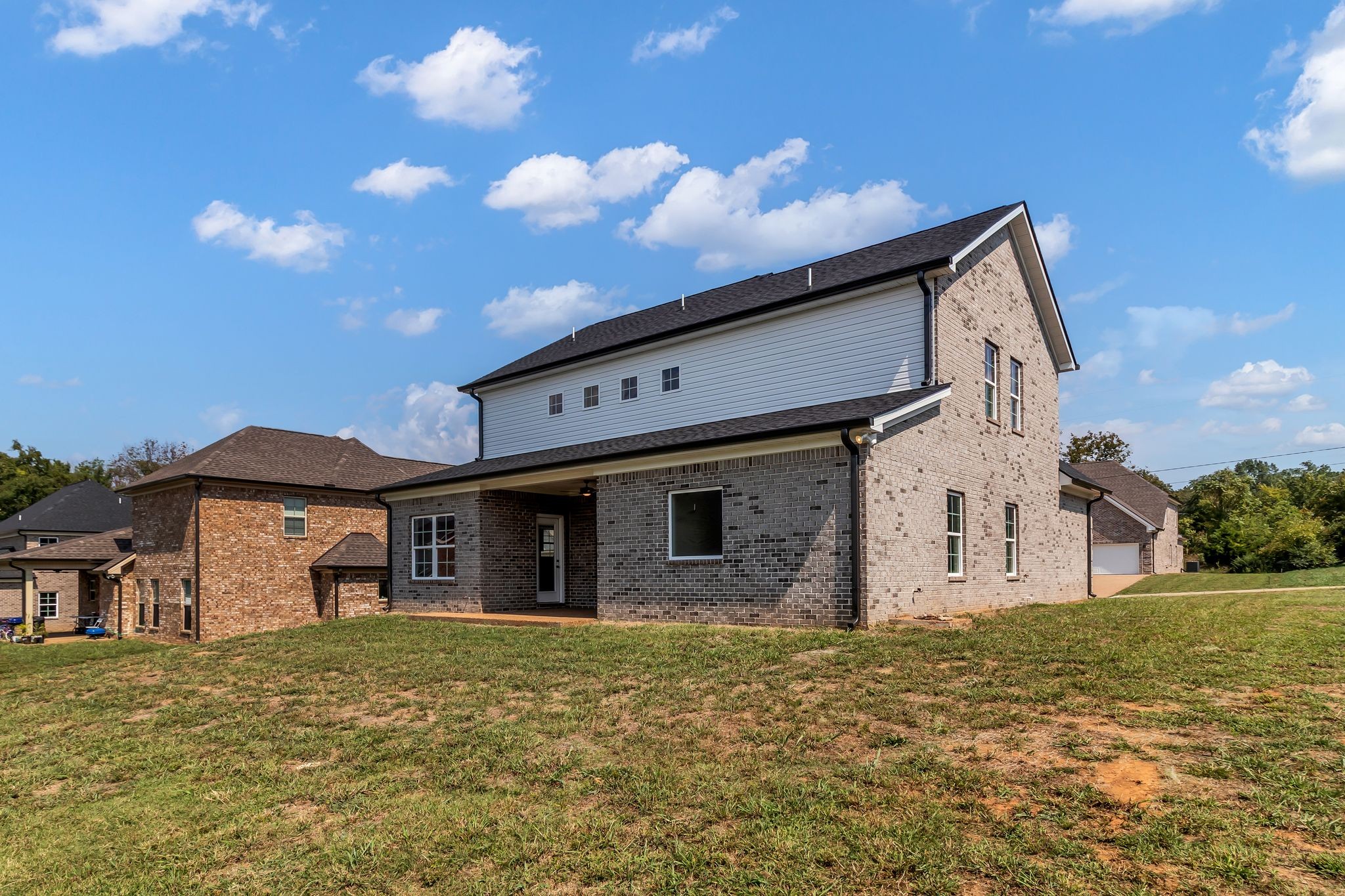 1176 Rimrock Road Smyrna, TN 37167 - Photo 36 of 40 a front view of a house with a garden