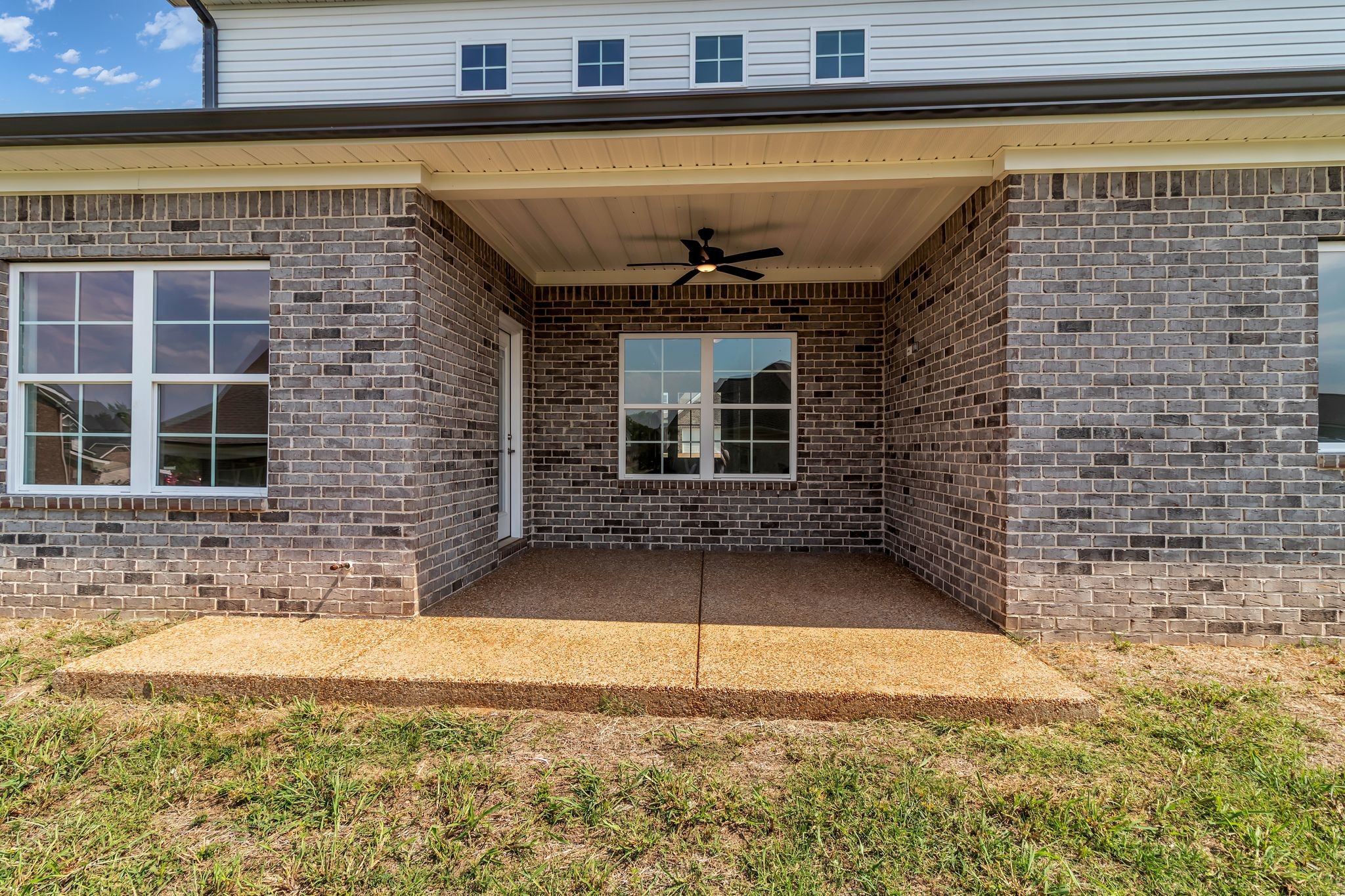 1176 Rimrock Road Smyrna, TN 37167 - Photo 38 of 40 a view of a brick house with outdoor space