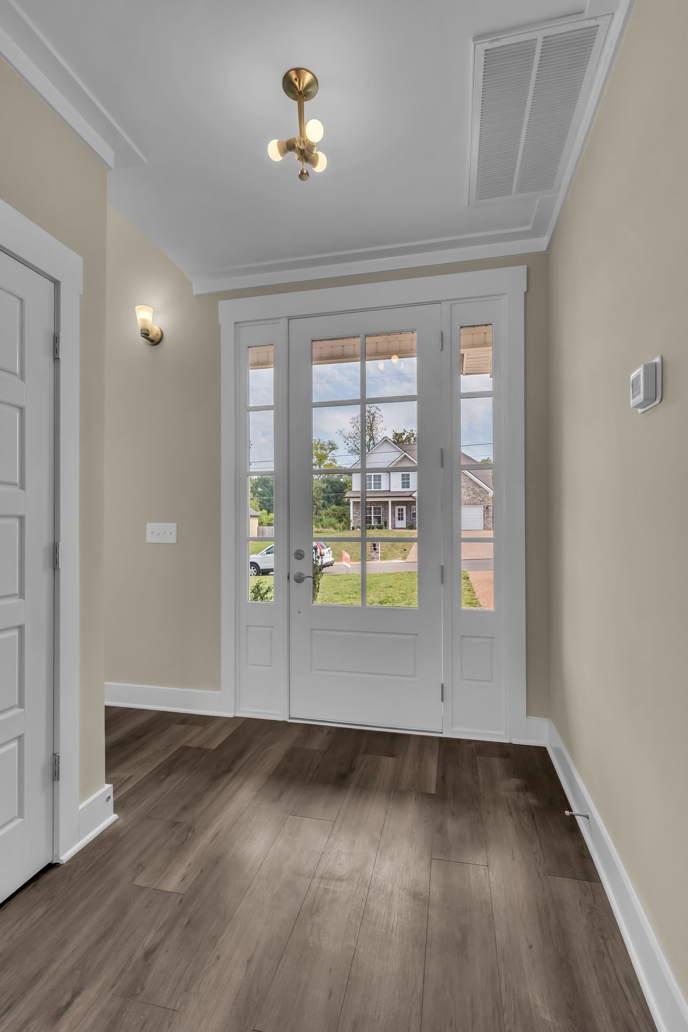 1176 Rimrock Road Smyrna, TN 37167 - Photo 7 of 40 wooden floor in an empty room with a window