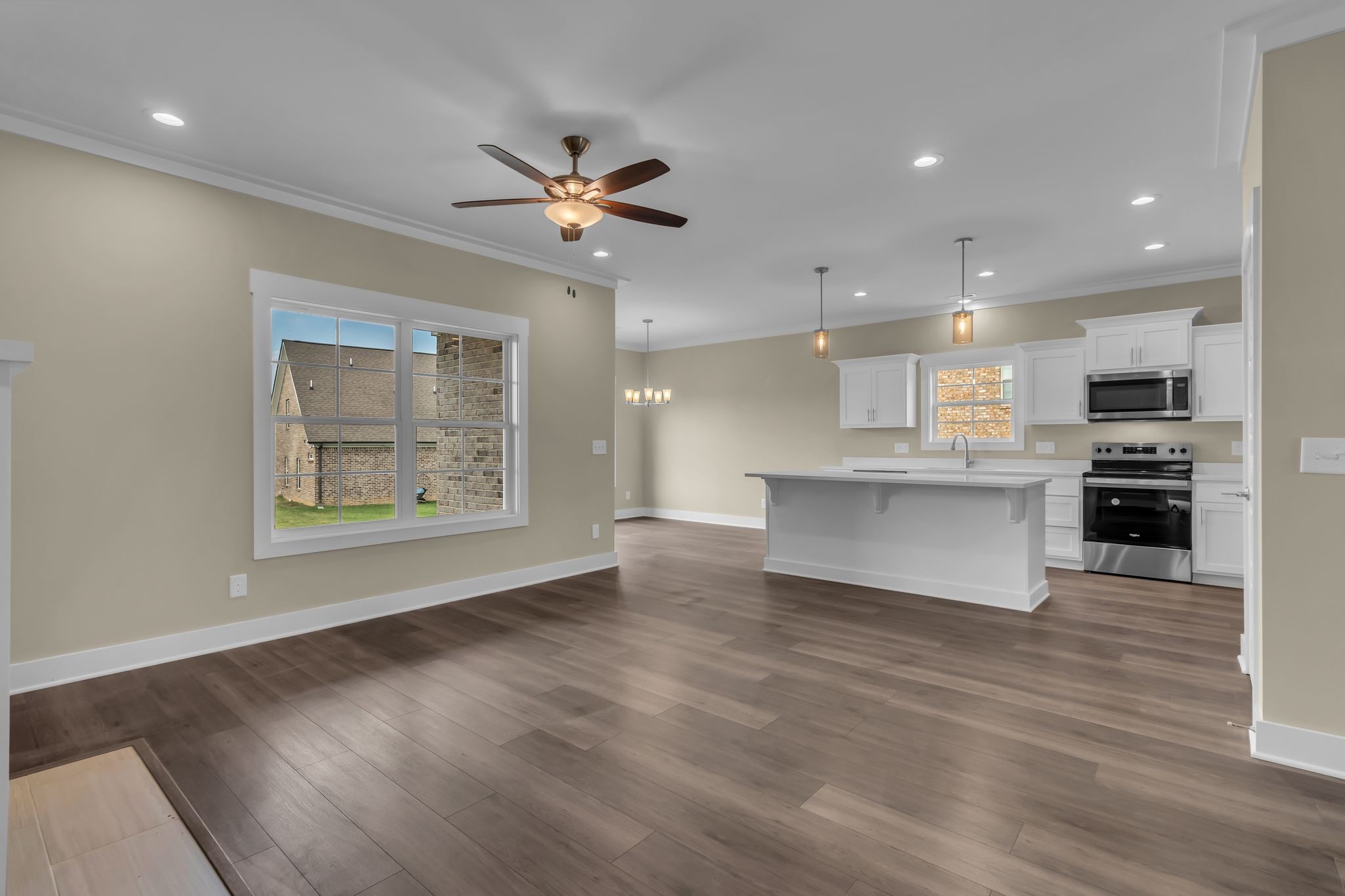1176 Rimrock Road Smyrna, TN 37167 - Photo 10 of 40 a view of an empty room with kitchen and window