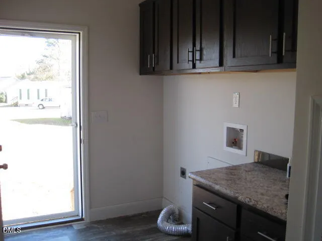 a kitchen with a sink and a window