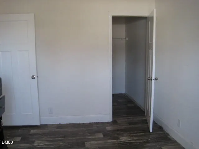 a view of a backyard of the house