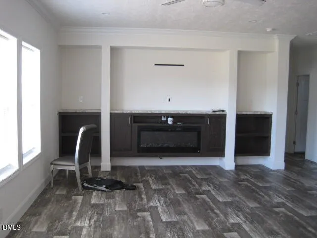 a room with a fireplace and a window