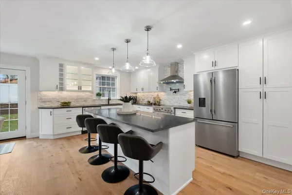 a kitchen with granite countertop lots of counter top space