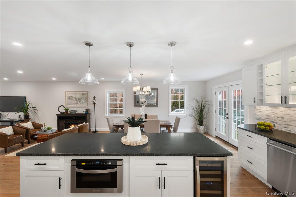 32 Ackerman Street Beacon, NY 12508 - Photo 18 of 50 a kitchen with a counter space cabinets and stainless steel appliances