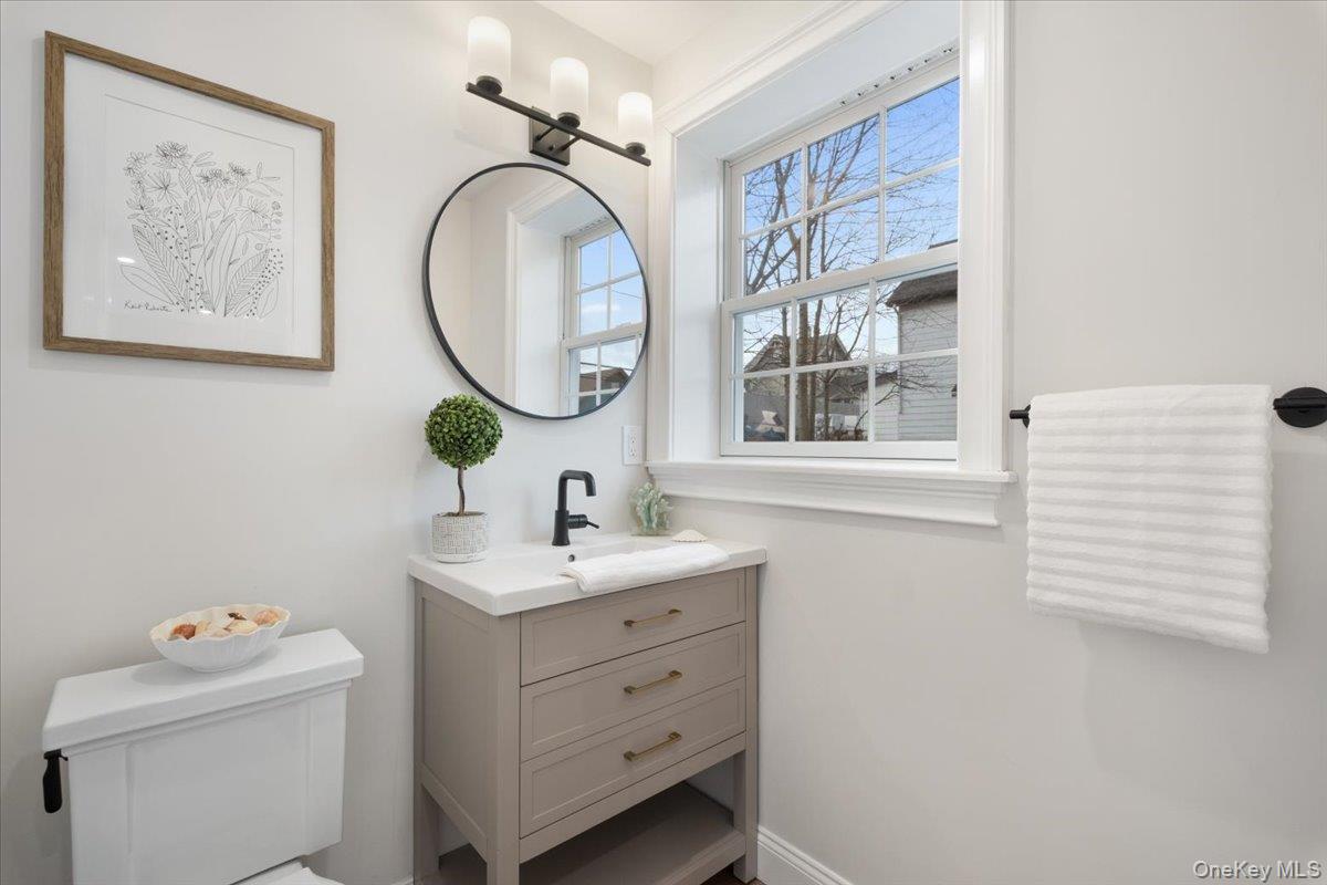 32 Ackerman Street Beacon, NY 12508 - Photo 19 of 50 a bathroom with a sink and a mirror