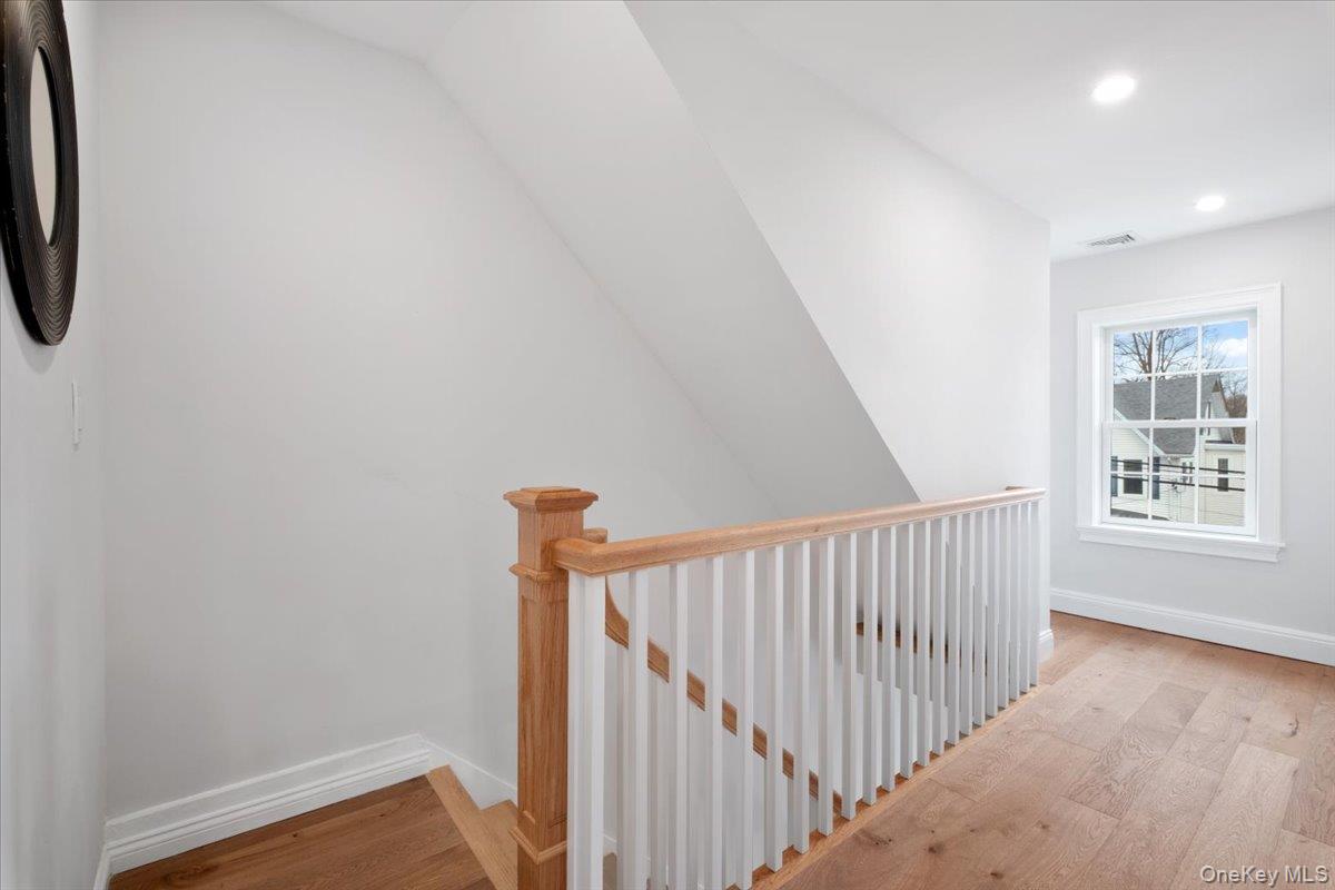 32 Ackerman Street Beacon, NY 12508 - Photo 20 of 50 a view of hallway with window and wooden floor