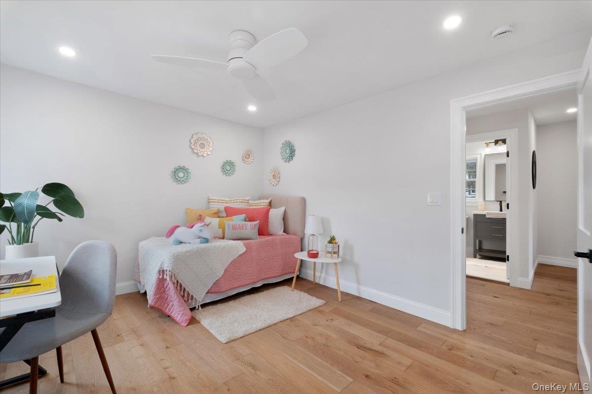 32 Ackerman Street Beacon, NY 12508 - Photo 24 of 50 a bedroom with a bed and a potted plant on the dresser