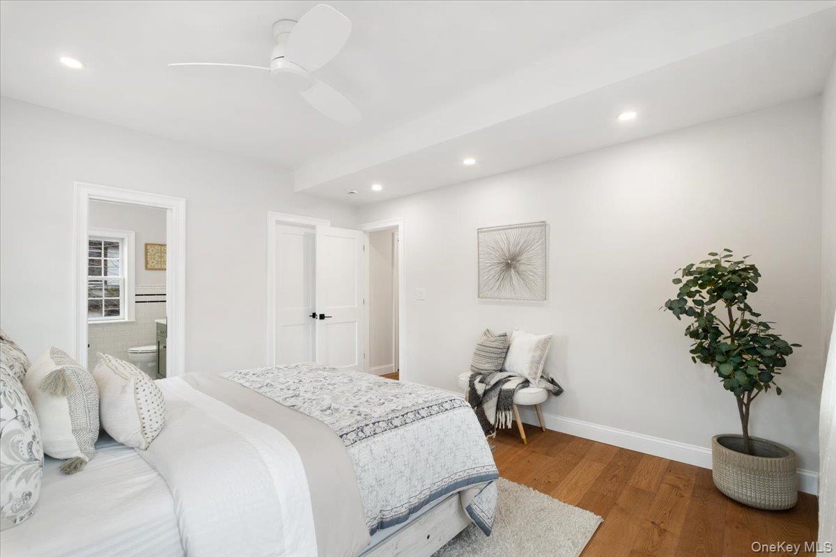 32 Ackerman Street Beacon, NY 12508 - Photo 29 of 50 a bedroom with a bed and a potted plant