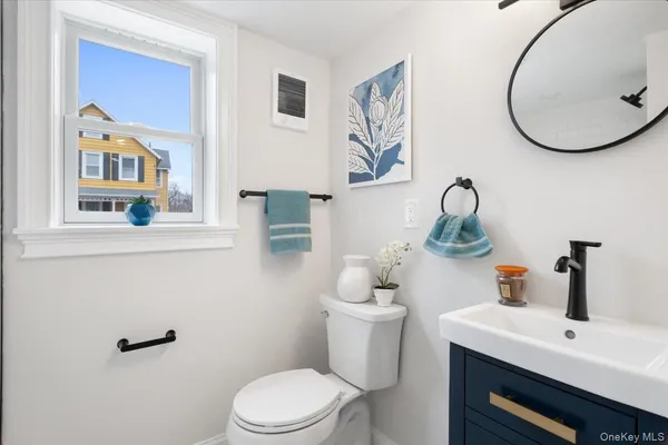 a very nice looking room with a ceiling fan